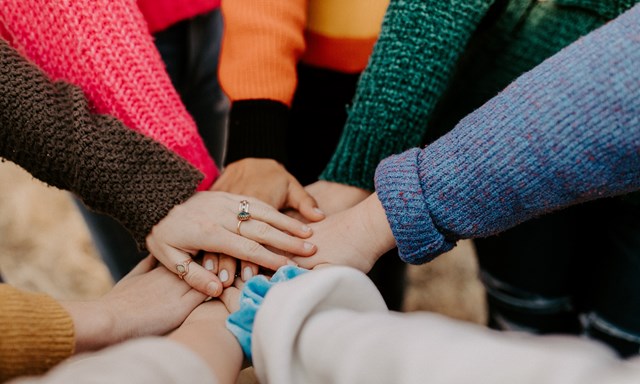 Team hands in the centre